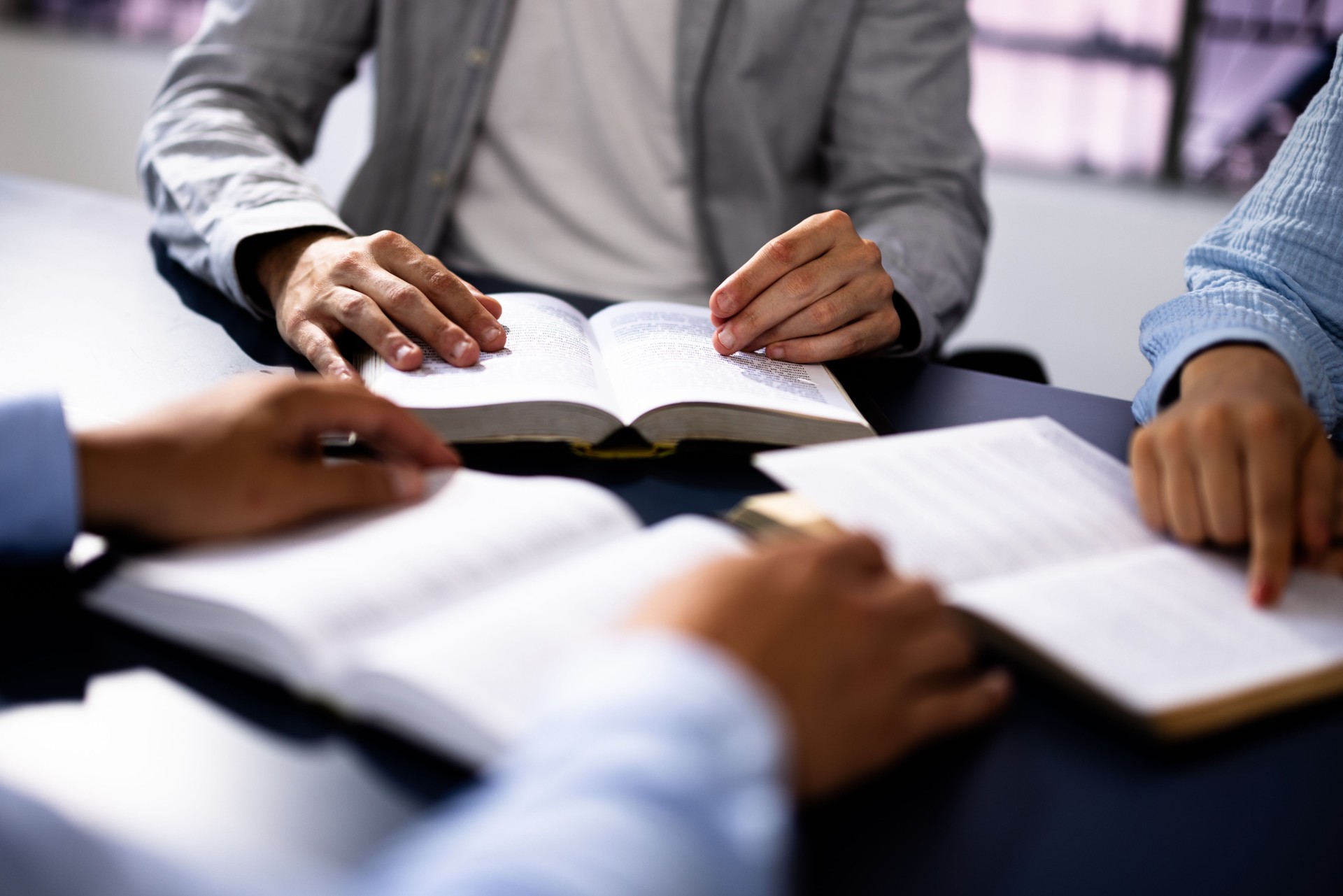 Christian Preacher Leads Bible Study With Friends, Spreading Faith